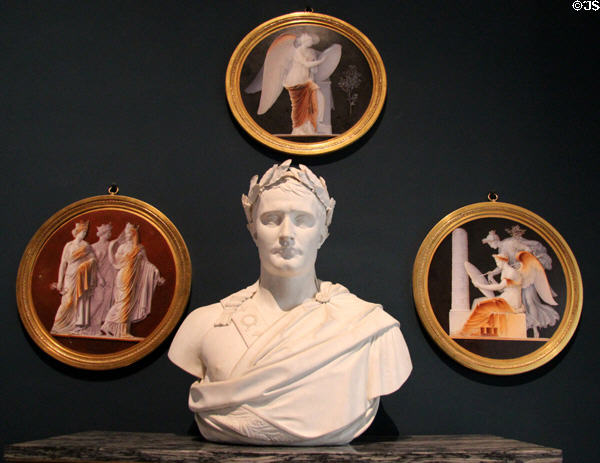 Porcelain bust of Napoleon I (1811) & relief plaques (1808-11) portraying themes of Napoleon by Sevres Manuf. at Louvre Museum. Paris, France.