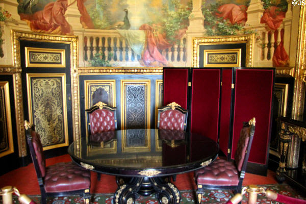 Small dining room from apartments of Napoleon III at Louvre Museum. Paris, France.
