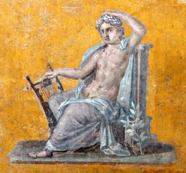 Seated Apollo wall fresco (c79 CE) from Pompeii estate of Julia Felix at Louvre Museum. Paris, France.