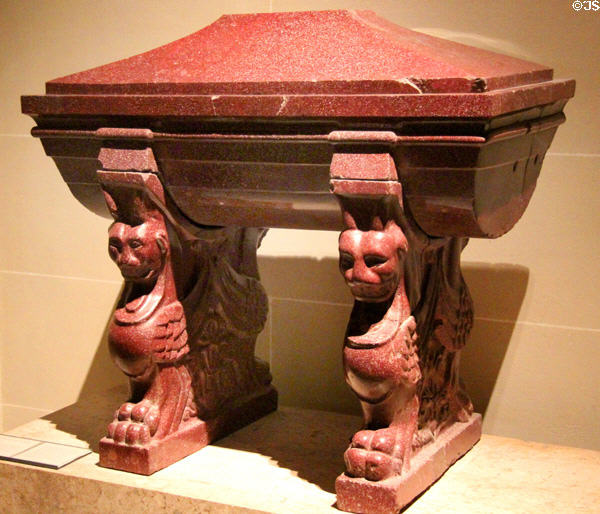 Porphyry burial urn supported by sphinxes (2ndC CE) from Rome used by Count of Caylus with modern cover at Louvre Museum. Paris, France.