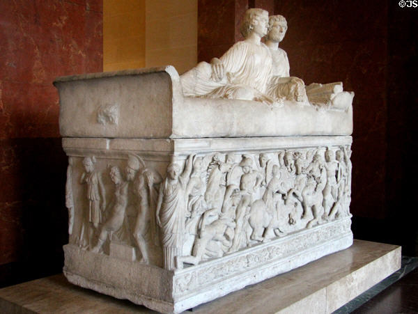 Marble sarcophagus with portrait carving of a couple on lid & scene of battle of Greeks & Amazons on front (c180 CE) found in Thessaloniki at Louvre Museum. Paris, France.