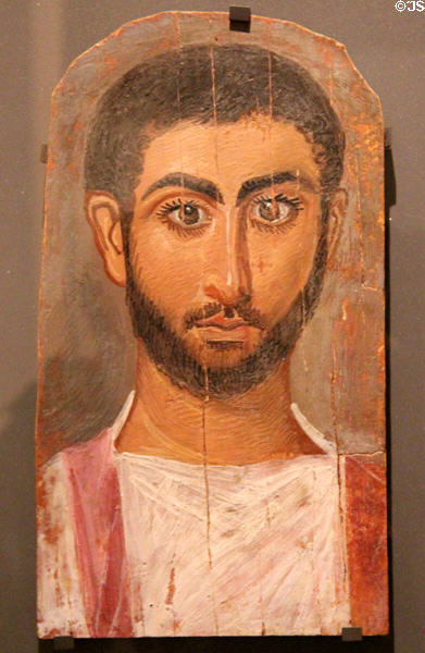 Wooden funerary portrait of man (3rdC CE) from Thebes, Egypt at Louvre Museum. Paris, France.