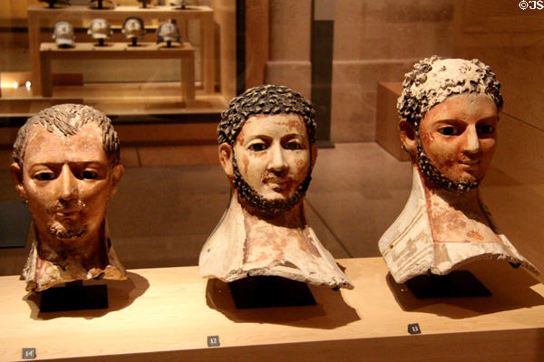 Plaster funerary masks (3rdC CE) from Hermopolis in Egypt at Louvre Museum. Paris, France.