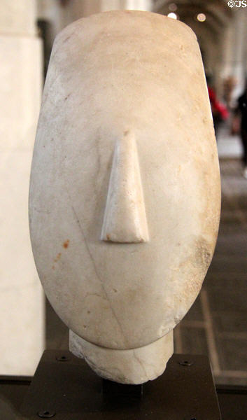 Cycladian marble face (c2750-2300 BCE) once part of 1.5m tall figurine at Louvre Museum. Paris, France.