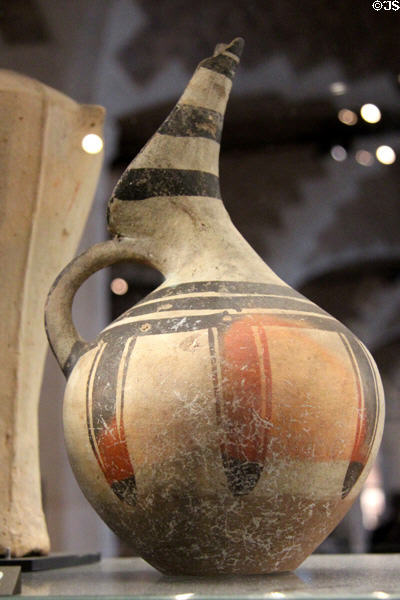 Cycladian terracotta jug with pulled-back neck (c1899-1799 BCE) decorated with geometric patterns at Louvre Museum. Paris, France.