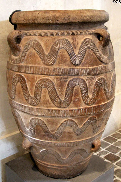 Minoan terracotta Pithos liquid storage jar (c1500 BCE) from Crete at Louvre Museum. Paris, France.
