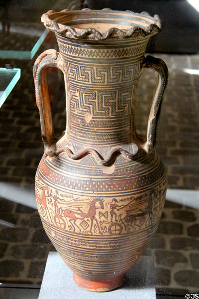 Athenian terracotta funerary amphora vase with painted horses & chariots (c720-700 BCE) at Louvre Museum. Paris, France.