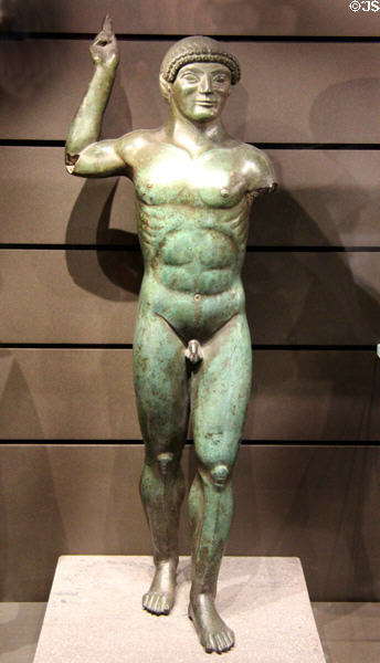Bronze statue of athlete (c500 BCE) made in Italian settlements of Greece at Louvre Museum. Paris, France.
