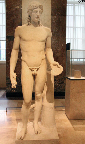 Marble statue of Apollo (1stC CE Roman copy of 5thC BCE original from Athens) at Louvre Museum. Paris, France.