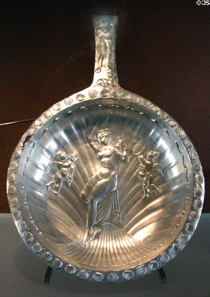 Silver Patera (ritual hand washing bowl with handle) embossed with Venus (4thC) from Rome at Louvre Museum. Paris, France.