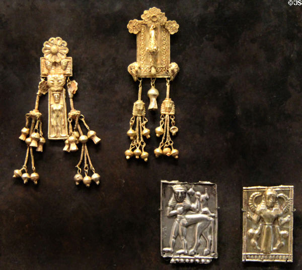 Gold & silver objects (BCE) for jewelry & votive uses from Crete & Rhodes at Louvre Museum. Paris, France.