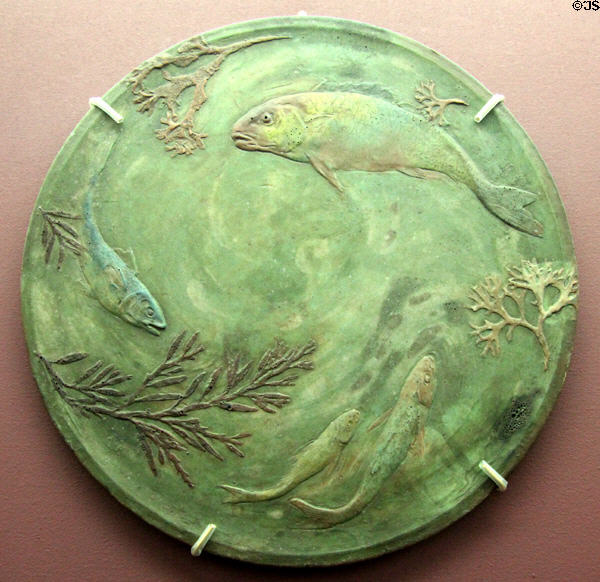 Sèvres stoneware plate with fish (c1900) by Albert Dammouse at Sèvres National Ceramic Museum. Paris, France.