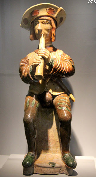 Glazed earthenware figure of chalémie flute player (mid 16thC) from Beauvaisis at Sèvres National Ceramic Museum. Paris, France.