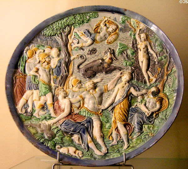 Glazed earthenware plate with moulded scene of Perseus delivering Andromeda (1590-1620) from Fontainebleau?, France at Sèvres National Ceramic Museum. Paris, France.