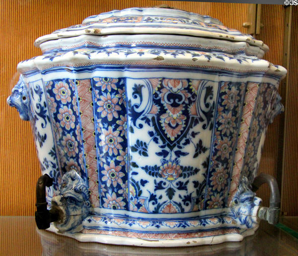 Ceramic water fountain painted with blue & red flowers (c1740) by Leroy Factory at Sèvres National Ceramic Museum. Paris, France.