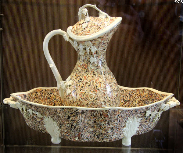Ceramic covered pitcher & basin (after 1728) by M de Brancas (baron of Castellet) from Apt, France at Sèvres National Ceramic Museum. Paris, France.