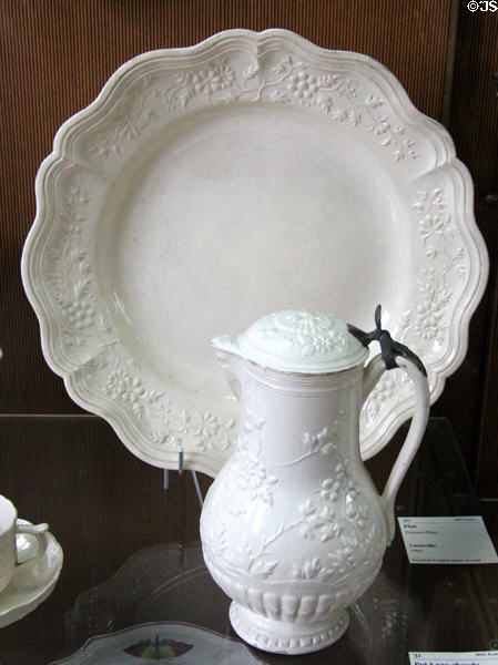 Ceramic hot water pot & plate (1760) from Lunéville, France at Sèvres National Ceramic Museum. Paris, France.