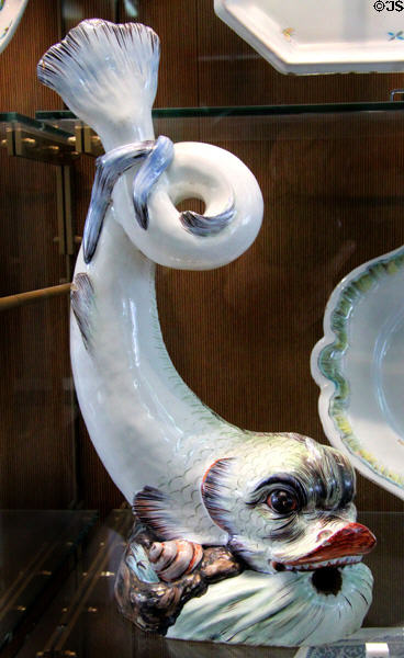Ceramic fountain in shape of dolphin (18thC) from Strasbourg at Sèvres National Ceramic Museum. Paris, France.