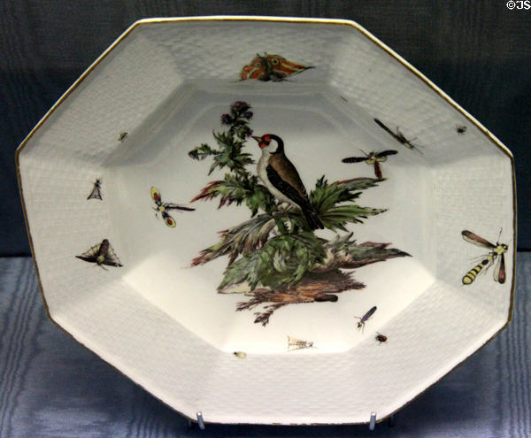 Meissen porcelain octagonal plate (c1745-50) painted with bird at Sèvres National Ceramic Museum. Paris, France.