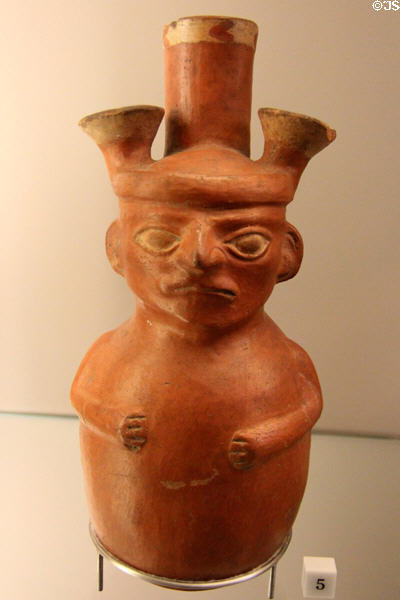 Moche terra cotta anthropomorphic figure bottle (600-700) from north coast of Peru at Sèvres National Ceramic Museum. Paris, France.