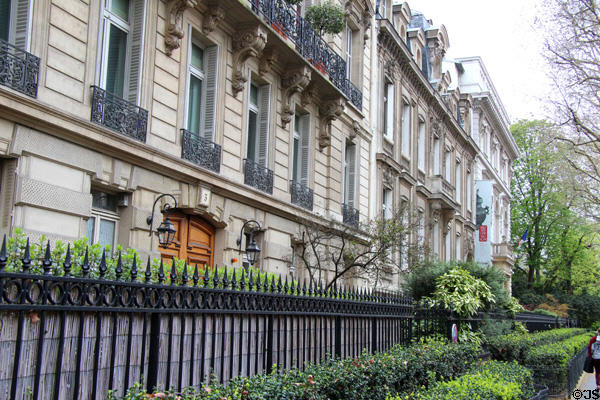 Neighboring mansions streetscape around Cernuschi Museum. Paris, France.