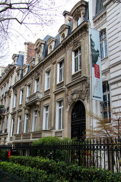 Neighboring mansions streetscape at Cernuschi Museum. Paris, France.