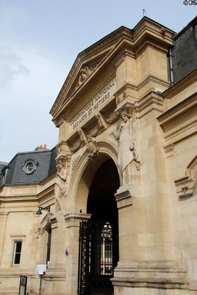 Entrance arch for Conservatoire National des Arts et Metiers, a repository of French firsts & history in science, inventions, professions & manufacturing established in 1794. Paris, France.