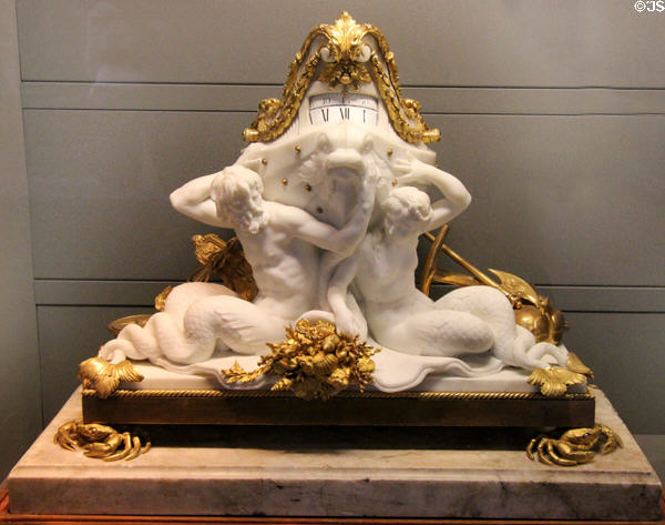 Clock with double annular face supported by two tritons (c1770) by Jean-André Le Paute at Arts et Metiers Museum. Paris, France.