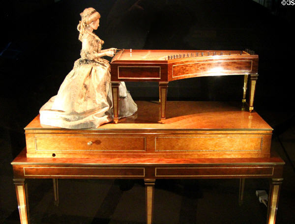 Mechanical musical tympanon player modeled after woman (1784) made by Pierre Kintzing & David Roentgen (given to Academie by Marie-Antoinette) at Arts et Metiers Museum. Paris, France.