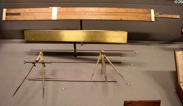 Slide rule (1671), log rule, differential-motion divider, triangular compass all (17thC) at Arts et Metiers Museum. Paris, France.