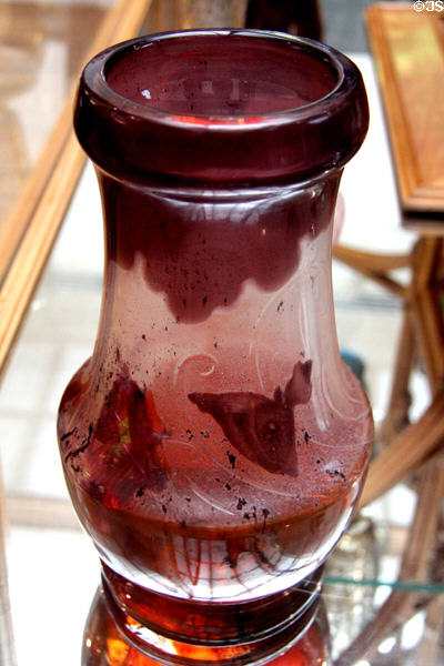 Reddish vase with inclusions by Émile Gallé at Arts et Metiers Museum. Paris, France.