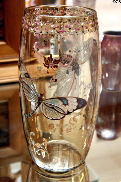 Clear glass dragonfly vase by Émile Gallé at Arts et Metiers Museum. Paris, France.