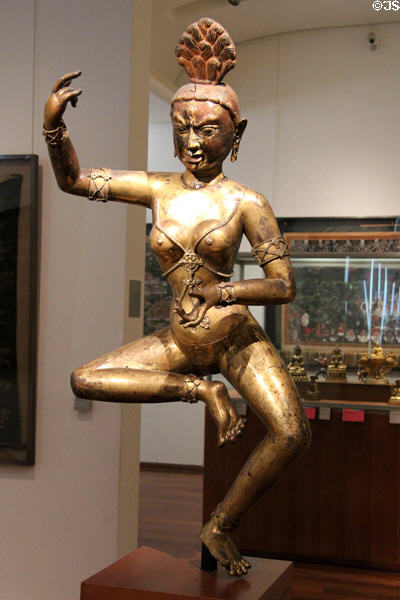 Gilded copper statue of dancer (18thC) from Tibet at Guimet Museum. Paris, France.