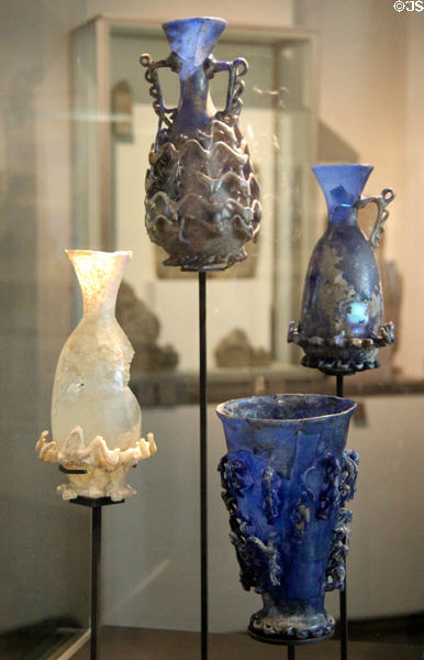 Blown blue glass bottles & vases (1stC) from Afghanistan at Guimet Museum. Paris, France.
