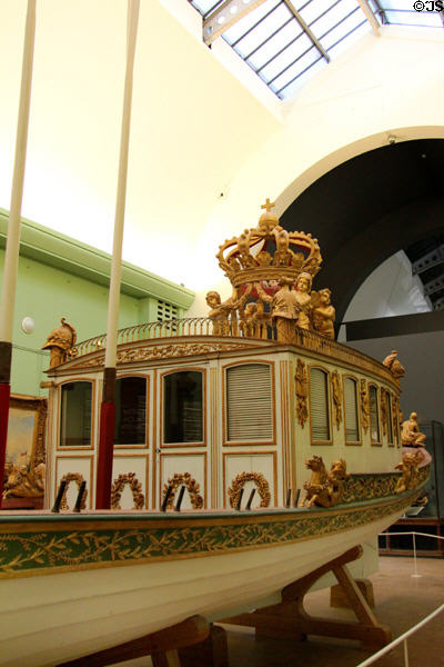 Cabin topped with crown on stern of Emperor Napoleon I canot (1810) at Musée de la Marine. Paris, France.