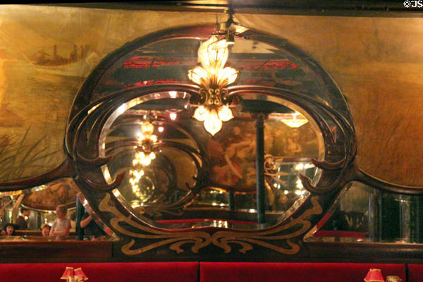 Maxim's Restaurant Art Nouveau mirror & lamps. Paris, France.