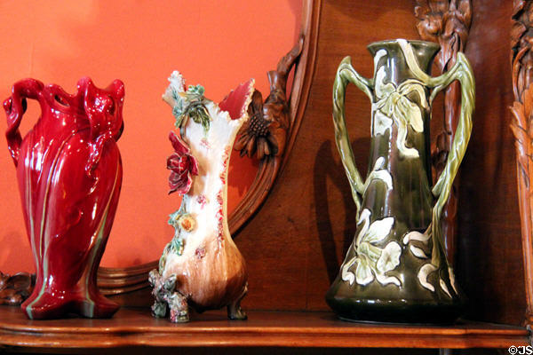 Art Nouveau ceramic vases with floral themes at Maxim's Art Nouveau Collection 1900. Paris, France.
