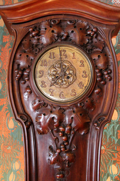 Detail of face of Art Nouveau tall clock at Maxim's Art Nouveau Collection 1900. Paris, France.