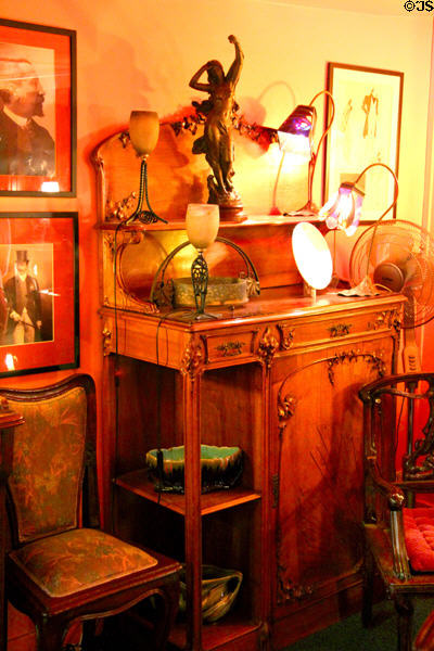 Display cabinet at Maxim's Art Nouveau Collection 1900. Paris, France.