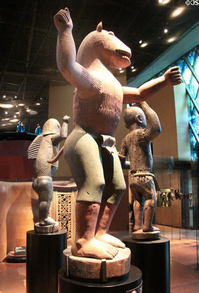 Carved wooden half-man / half-animal royal statues (late 19thC) from Abomey, Benin at Musée du quai Branly. Paris, France.