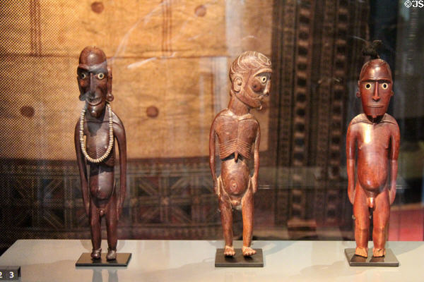 Rapa Nui (Easter Island) wood sculptures of men (19thC) at Musée du quai Branly. Paris, France.