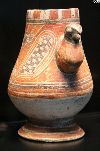 Terra cotta vase with bird-shaped handle (800 - 1200) from Guanacaste, Costa Rica at Musée du quai Branly. Paris, France.