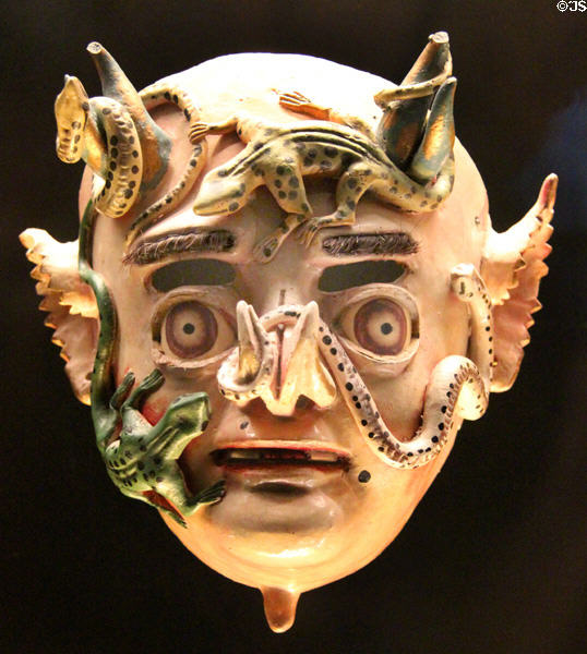 China Supay mask (20thC) for Diablada of Carnival de Oruro dance representing combat between Archangel Michael & Lucifer in Bolivia at Musée du quai Branly. Paris, France.