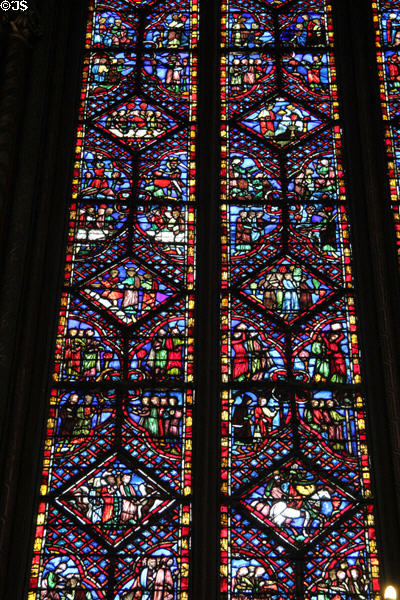 Diamond-shape stained glass biblical & historical story panels at St Chapelle. Paris, France.