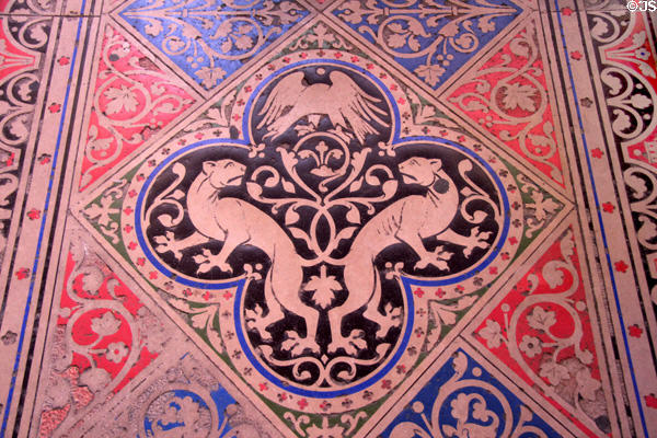 Inlaid stone floor detail with lions chasing bird at St Chapelle. Paris, France.