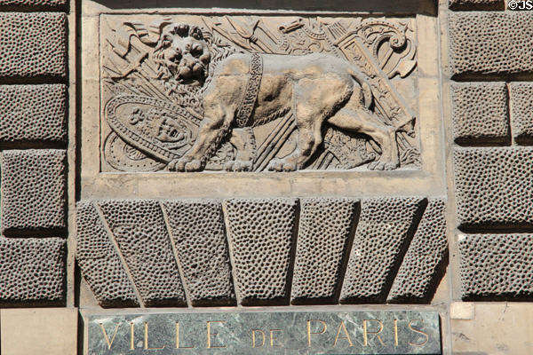 Lion carving by Goujon next to entrance at Carnavalet Museum. Paris, France.
