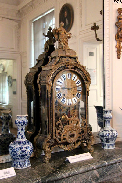 Large mantel clock with neoclassical figures (Louis XIV era) by Tallon Le Fils at Carnavalet Museum. Paris, France.