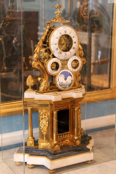 Ornate multi dialed clock (c1785) with gilded bronze, enamel & marble by Dubief at Carnavalet Museum. Paris, France.