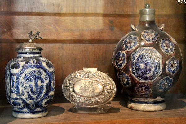 Cobalt blue stoneware flasks & silver box with ship designs at Carnavalet Museum. Paris, France.