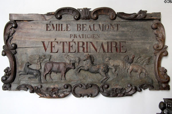 Veterinary practice sign with carved animals (19thC) at Carnavalet Museum. Paris, France.
